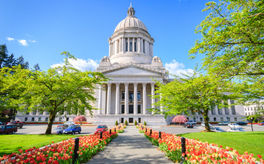 Washington Gov. Jay Inslee signed a bill to reduce workplace injuries into law on April 20. (Zack Frank/Adobe Stock)