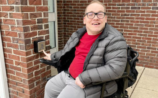 Robert Fisher of Adel, Iowa, prevailed in his efforts to have an electronic button installed to operate the door at the local U.S. Post Office. (Robert Fisher/Iowa Council on Developmental Disabilities)