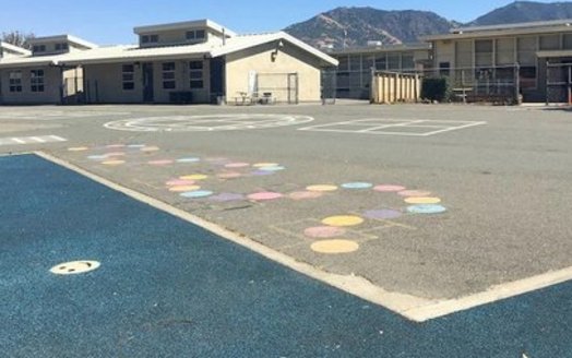 A schoolyard in Concord, California. More than 4.2 million of the students in California public schools are on campuses with less than 10% tree canopy, half with less than 5%. (Sharon Danks)