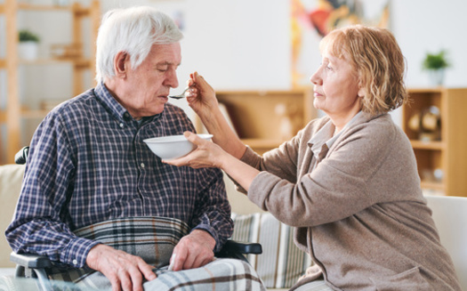 Across the nation, AARP says the estimated economic value of family caregivers' unpaid contributions now stands at $600 billion. (Adobe Stock)