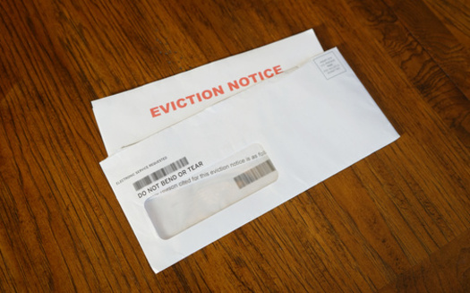 Evictions are traumatic experiences for families, and new project in King County, Washington, is providing support to prevent them. (Rick/Adobe Stock)