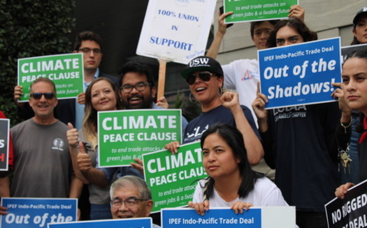 Advocates of a Climate Peace Clause protested outside trade negotiations in Los Angeles last year. (Will Wiltschko/Trade Justice Education Fund)