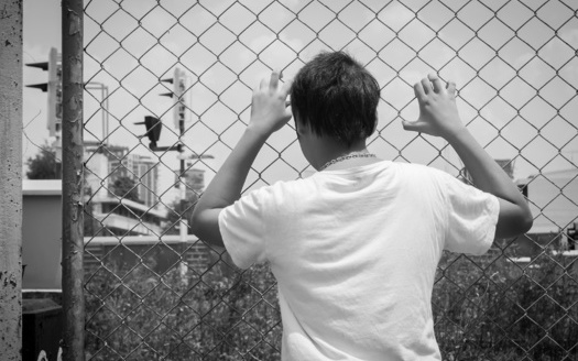 Illinois had almost 1,000 juveniles incarcerated in adult correctional facilities in 2021, at an annual cost of almost $33 million, according to a Human Rights for Kids report. (napatacha/Adobe Stock)
