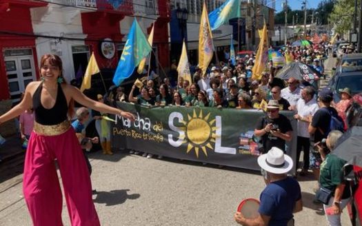 In March 2023, thousands lined the streets of Adjuntas for Casa Pueblo's second annual rally for solar energy. (Photo courtesy od Katherine Rapin)