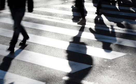 The number of pedestrian deaths in Iowa fell by nearly 44%, from 32 to 18 between 2021 and 2022, according to the Governor's Highway Safety Association. The state has directed funds to 10 locales to focus on making conditions safer for pedestrians. (Adobe Stock)