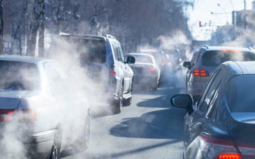 The proposed standards would provide important benefits to communities near major roadways, where people of color and people with low income are disproportionately exposed to air pollution from vehicles. (Nady/AdobeStock)