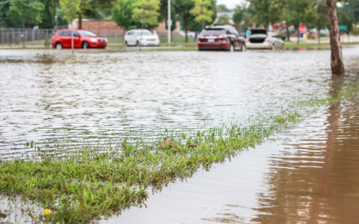 Impervious surfaces in urban areas are a major hydrologic alteration contributing to increased stormwater runoff and pollutant loading during rainfall and snowmelt events. (Soupstock/AdobeStock)