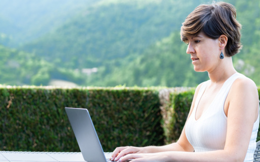 With more federal funding coming Minnesota's way to improve broadband access, advocates said it might create more remote work opportunities for those who want to move to rural areas. (Adobe Stock)