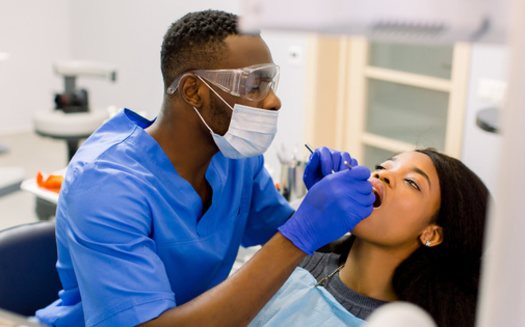 The costs of employing a dental therapist are about a third to a half that of a dentist, making hiring them an affordable way to treat more low-income and uninsured patients, according to the National Partnership for Dental Therapy. (Adobe Stock)