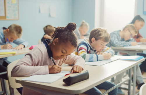 Along with boosting reading comprehension, other elements of the American Federation of Teachers' campaign include garnering more support staff and necessary teacher resources, and making strides to improve youth mental health. (Adobe Stock)