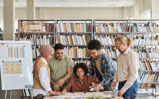 The Transactional Records Access Clearinghouse finds there are more than 10,000 immigrants in ICE detention as of July 2023, down from a high of 20,000 in May 2019. (Adobe Stock)