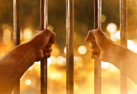 Rising temperatures and heat waves are having severe effects on incarcerated people's physical and mental health. A Prison Policy Initiative report found suicides increased by 23% in the three days following days of extreme heat. (Adobe Stock)