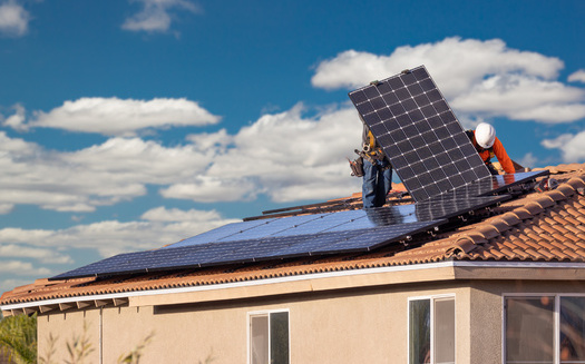 Credit unions are lending to households and small businesses to install solar and other improvements, which are costly up front, loans frequently considered too small by bigger banks. (Adobe Stock)