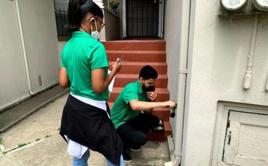 The Climate Careers program with the Rising Sun Center for Opportunity in Oakland employs young adults to help families improve their home's energy efficiency. (Rising Sun Center for Opportunity)