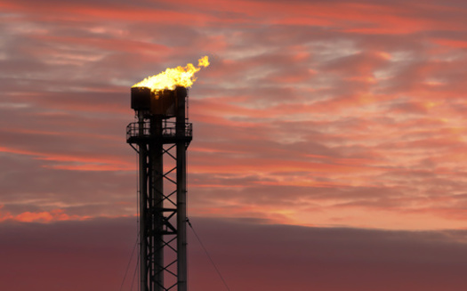 A new poll by four environmental groups found a majority of Texas voters, 58% to 33%, want the Environmental Protection Agency to strengthen its proposal to eliminate emissions from routine flaring at oil wells. (Alexisaj/Adobestock)