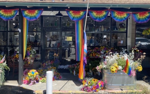 A memorial has spring up outside Lauri Carleton's store in Cedar Glen, Calif., in the wake of her murder. (Michael Feddersen)