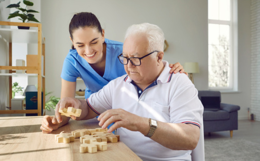 Some 70% of Michigan residents are either currently providing care or have provided care in the past for an adult relative or friend. (Studio Romantic/Adobe Stock)