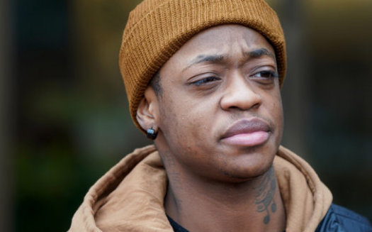 Nizer Lukerson, a delivery driver, stands outside Cleveland Heights City Hall after appearing in municipal court for driving under suspension. Lukerson owes $1,000 in fines to remove a number of suspensions issued in local courts for minor infractions. (GUS CHAN FOR THE MARSHALL PROJECT)<br />