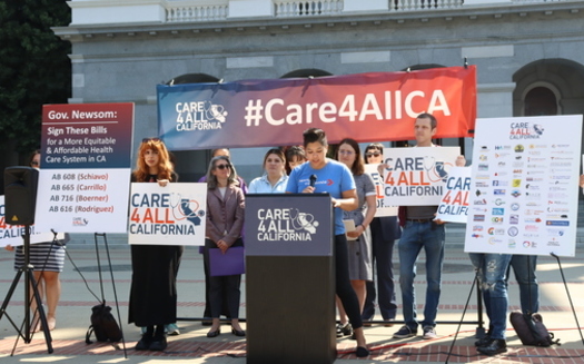 The Care4All campaign held a rally this week on the Capitol Steps in Sacramento, urging Governor Newsom to sign a package of bills. (Kit Bear/Health Access)