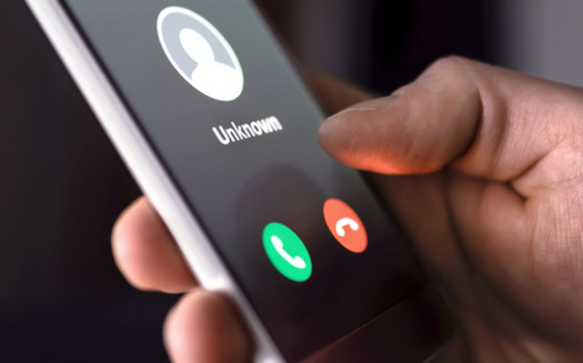 To avoid scams, people are advised not to share personal information with unknown callers. (terovesalainen/Adobe Stock)