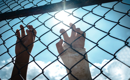 This year Illinois lawmakers passed a bill ending life sentences without parole for people in Illinois who were under 21 when they were arrested. (Adobe Stock)