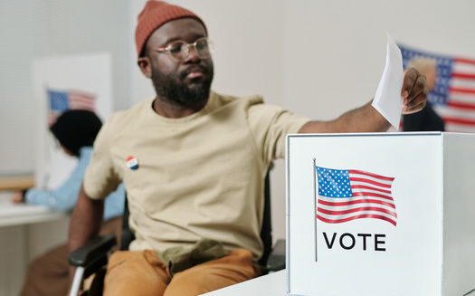 A Brennan Center for Justice report finds 58% of early voting polling places surveyed didn't have proper signs prohibiting parking in access aisles for wheelchair users to get in and out of their cars at parking spaces. (Adobe Stock)