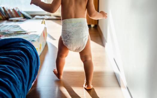 Nationally, 25% of parents with diaper need reported they have missed an average of five days of work or school in the past month due to not having enough diapers to drop children off at child care. (Joaquin Corbalan / Adobe Stock) 
