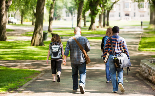 People with additional years of education beyond high school tend to be more civic-minded and interact more with neighbors and family members, according to a recent Gallup poll. (Tyler Olson/Adobe Stock)