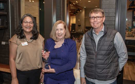 Anne Bellegia, center, is the recipient of an award recognizing volunteerism in Oregon. (AARP Oregon)
