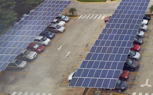 Solar canopies are expected to produce nearly 10 million kilowatt-hours of electricity a year, and eliminate 70,000 metric tons of climate pollution over the next decade. (Adobe Stock)