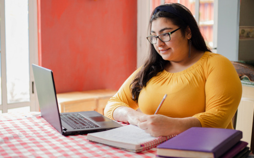 College students pay upwards of $1,100 a year for books and supplies, so many schools are working to reduce that burden.(Fernanda/Adobe Stock)