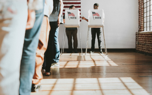 A 2021 poll conducted by the University of Massachusetts Amherst found 65% of residents support same-day voter registration, compared to 28% who oppose it. (Adobe Stock)