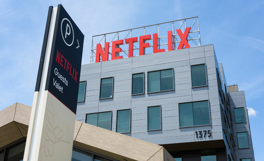 Many of the companies lobbying for tax breaks have paid very little in taxes. Netflix, for example, has paid federal corporate income taxes equal to less than 1% of its reported profits over four years. (Adobe Stock)