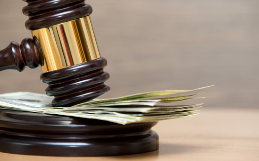 Congress is considering a bill to ease the tax burden on consumers who win a judgment in fraud cases. (Pakhnyushchyy/Adobe Stock)