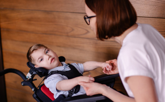 In the midst of personal stories of dedication and sacrifice, the fate of family caregiving services now rests on the outcome of a critical public comment period, as Indiana parents strive to secure continued support for the unique needs of their children. (Adobe Stock)