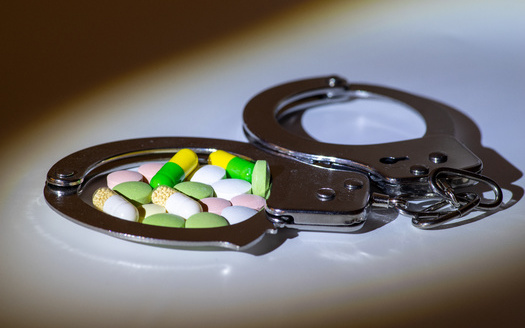 The opioid crisis led to more arrests across the U.S. including New Mexico, which now offers services to combat recidivism in 14 of 33 counties. (JUN LI/AdobeStock)<br />
