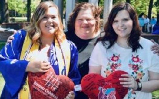 Stephanie Bowden is pictured with her mother and sister. (Courtesy Hannah Booth Photography)