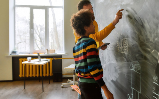 South Dakota's largest teacher's union said while the state has made progress in compensating educators, it still lags behind neighboring states. (Adobe Stock)