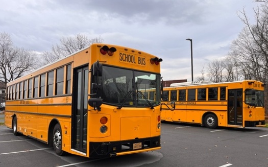 Because of their large batteries, electric school buses can be used as backup power sources for utilities when they are not in use during the summer. (Adobe Stock)
