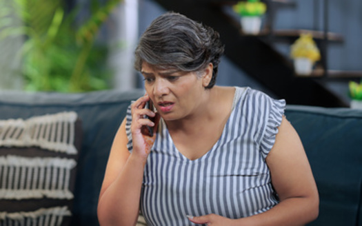 A new bill would direct the Department of Health and Human Services to carry out a new grant program, to fund a 24/7 helpline for parents and youths. (Raushan_films/Adobestock)