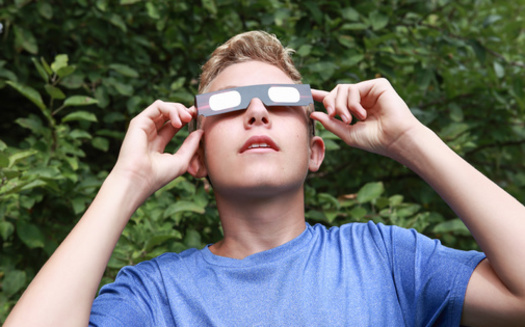 The New Hampshire Space Grant and the University of New Hampshire have distributed 33,000 pairs of eclipse glasses to students, teachers, firefighters and police in anticipation of today's total solar eclipse. (Adobe Stock)