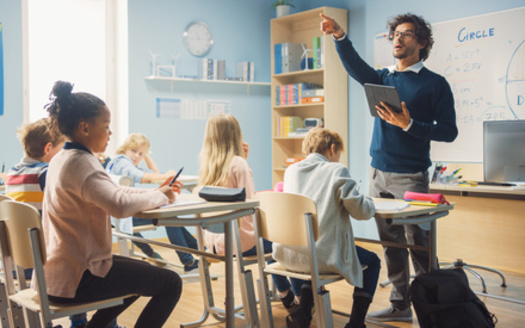 A recent survey commissioned by EdWeek Research Center found on average, teachers said they thought they realistically deserved a 31% raise. (Adobe Stock)