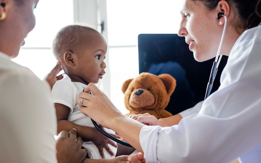 Research shows children in families of color, particularly Black and Latino families, have been more likely to experience gaps in health coverage. (Adobe Stock) 