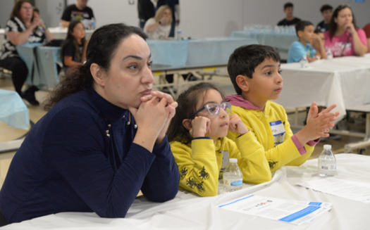 Families at Luiseno Elementary School in Corona listen to a recent workshop featuring the Ready, Tech, Go program. (Lifetouch)