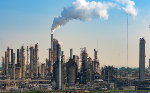 Industrial emissions of carcinogenic chemicals disproportionately occur in neighborhoods where African American, Hispanic, Latino residents, including many living in poverty. (Oleksii Fadieiev/Adobe Stock)