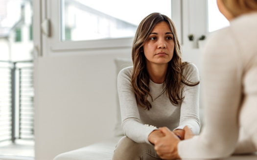 A report from the nonprofit Inseparable found the rollout of 988 is something with which states are struggling and support is available to get it done. (bnenin/Adobe Stock)