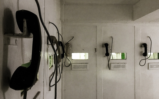 Advocates said people in detention have come to depend on free phone access while navigating the isolation and deprivation behind bars. (Adobe Stock)