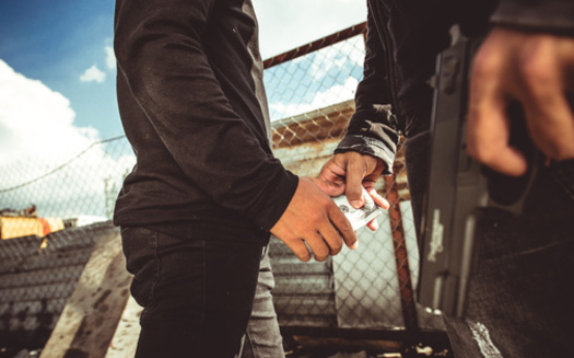 Stanford University researchers say immigrants are 60% less likely to be incarcerated than American-born people. (DragonImages/Adobe Stock)