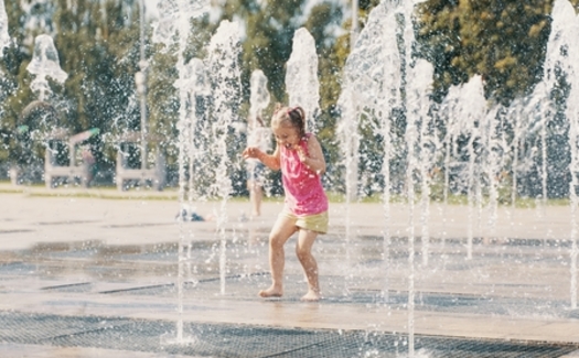 Water parks are a good way to keep cool in the summer but the public health experts reminded parents to always supervise children playing in or near the water. (Adobe Stock)