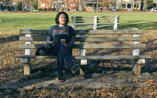 Huntington, W.Va., resident Lindsey Crittendon, a former social worker, is a graduate of NewForce, a fully remote and tuition-free coding school program. (Adobe Stock)<br />